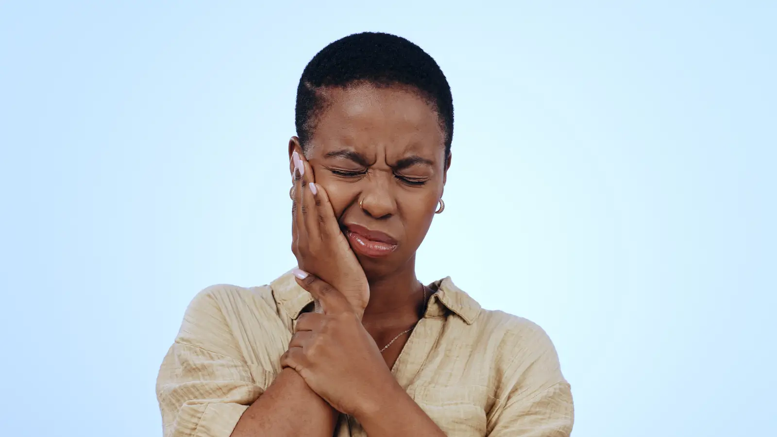 a woman suffering from toothache